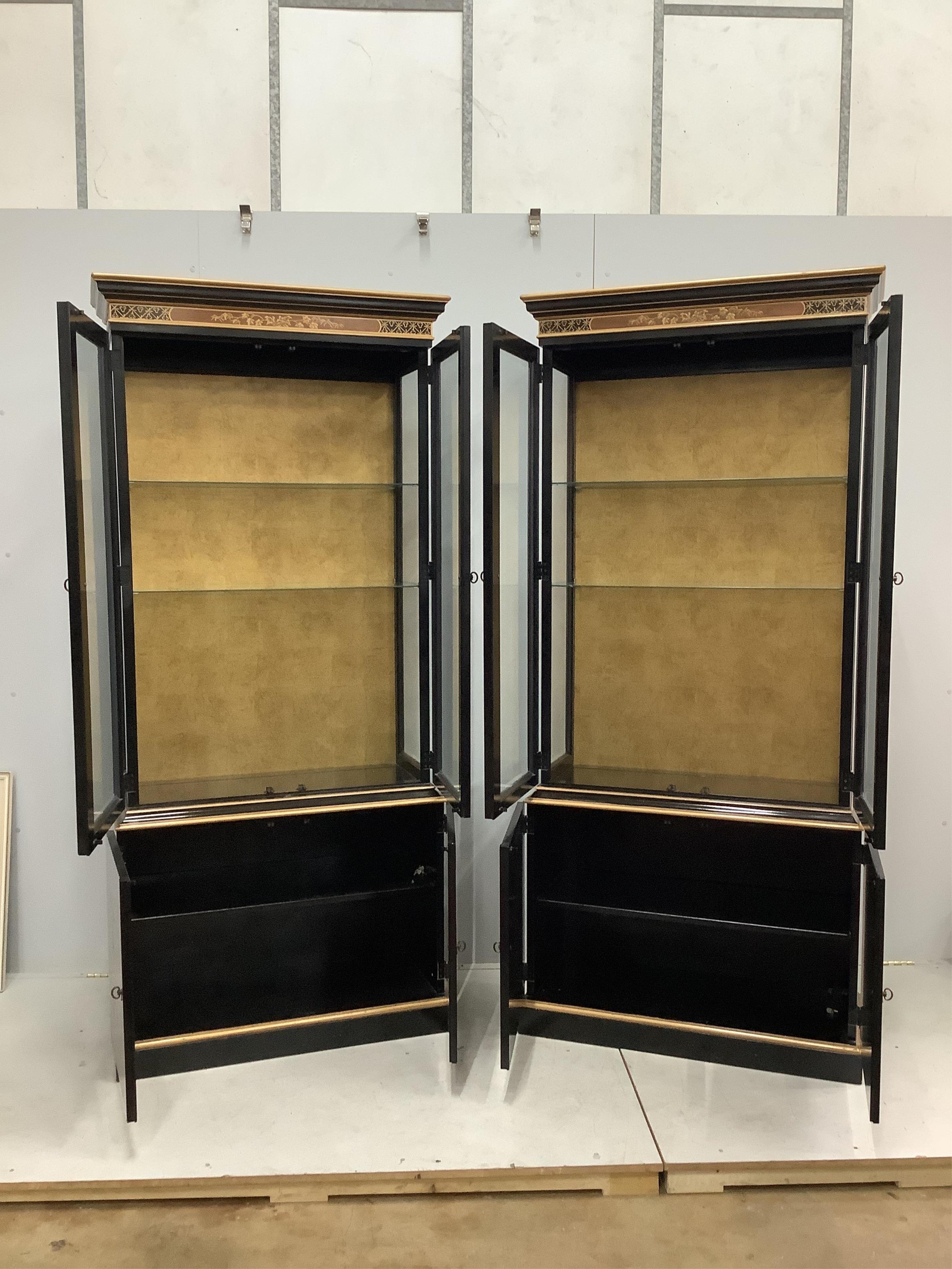 A pair of modern chinoiserie lacquered display cabinets, width 90cm, height 204cm. Condition - good